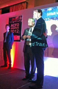 Kevin Griffin, fleet director of Ford, accepts the ACFO van award